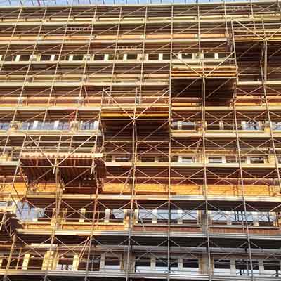 河南廠家平面仿石多彩漆建筑翻新應用